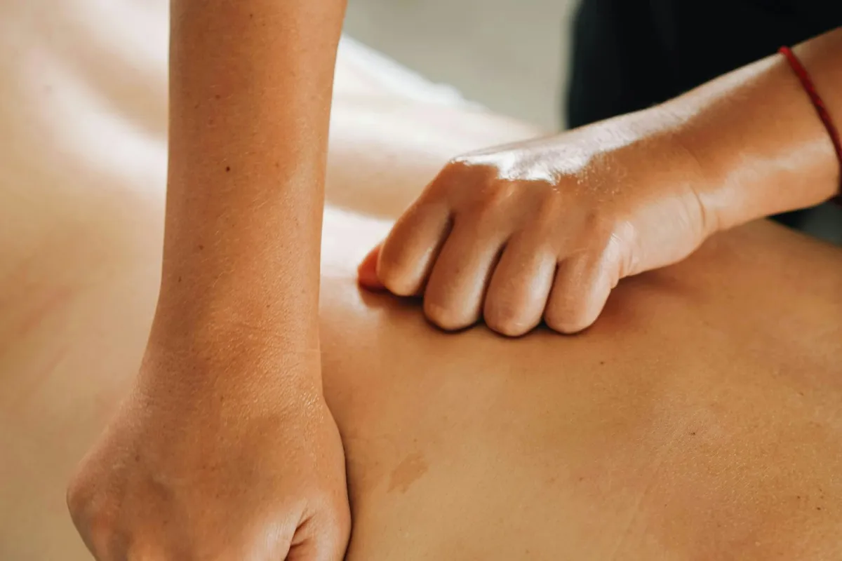 Forearm pressure used in a flowing massage