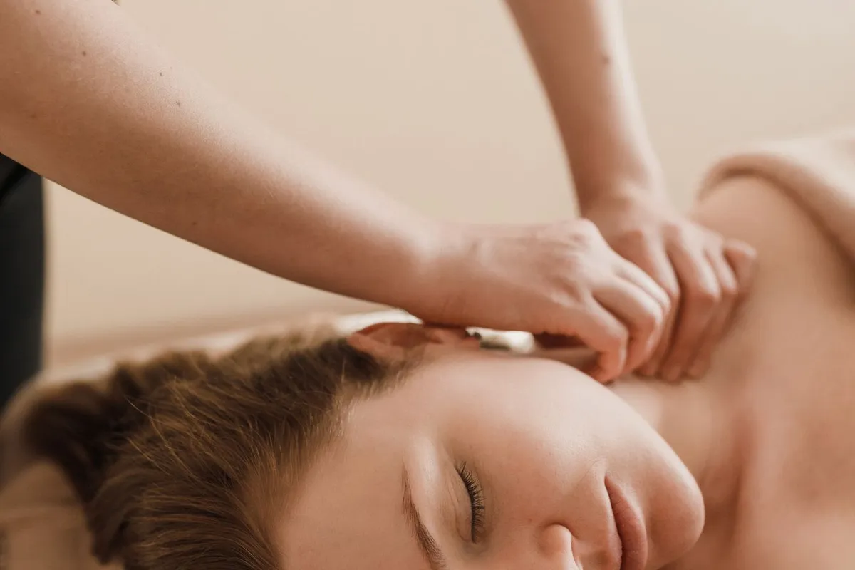Pressure-point massage in a calm spa setting